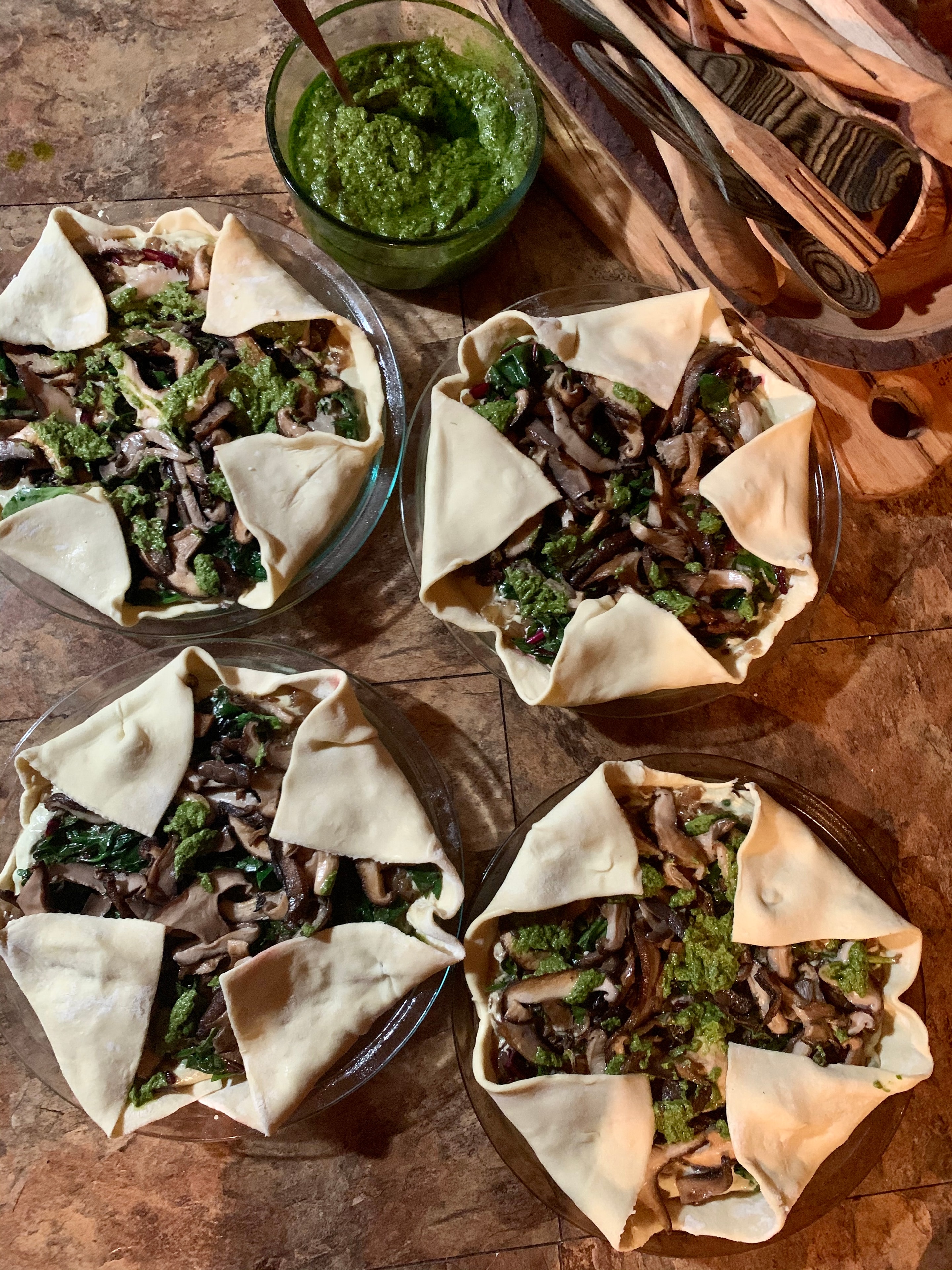 Mushroom and greens galette cups with pesto
