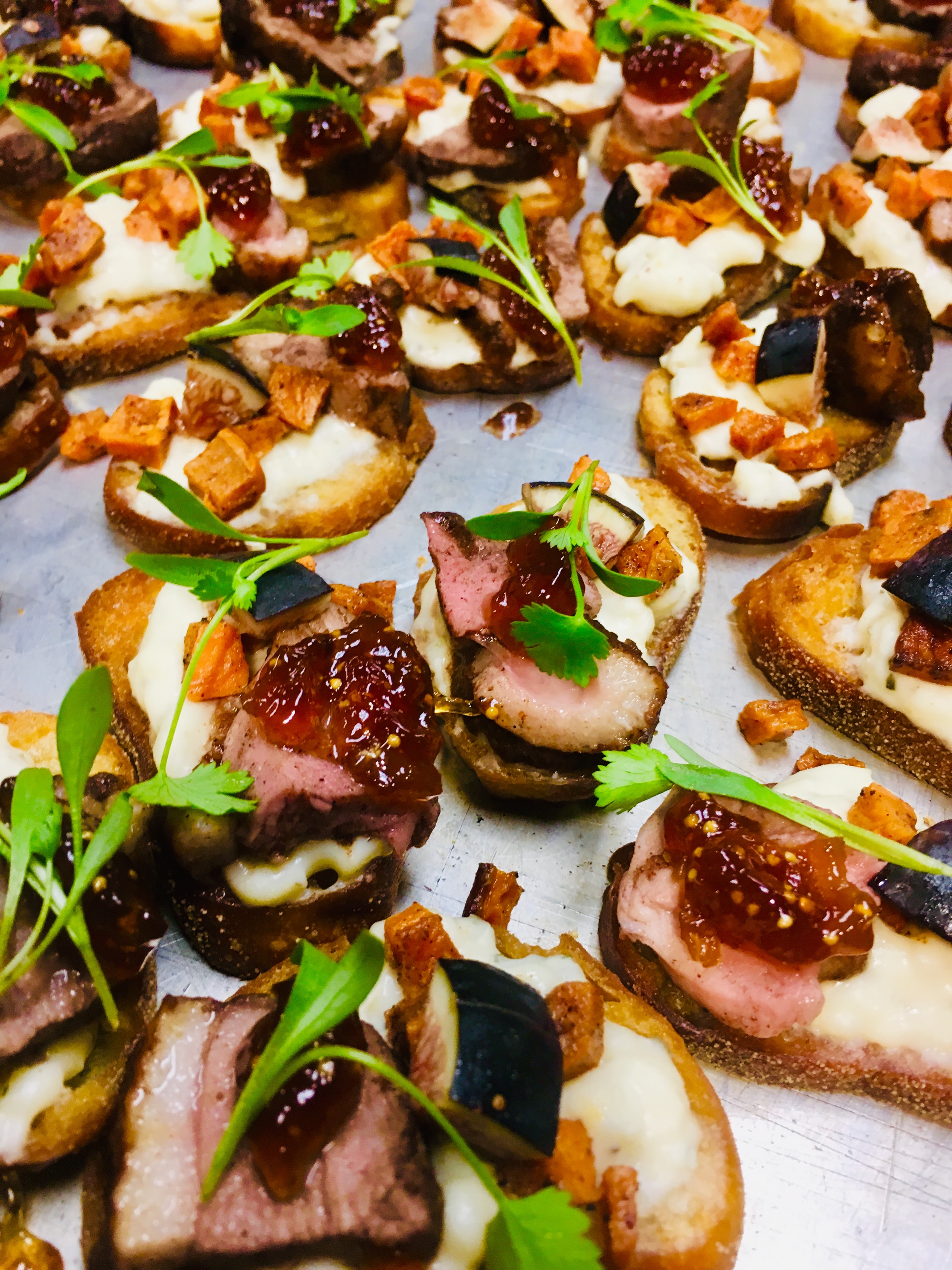 Gourmet beef crostini with fig jam