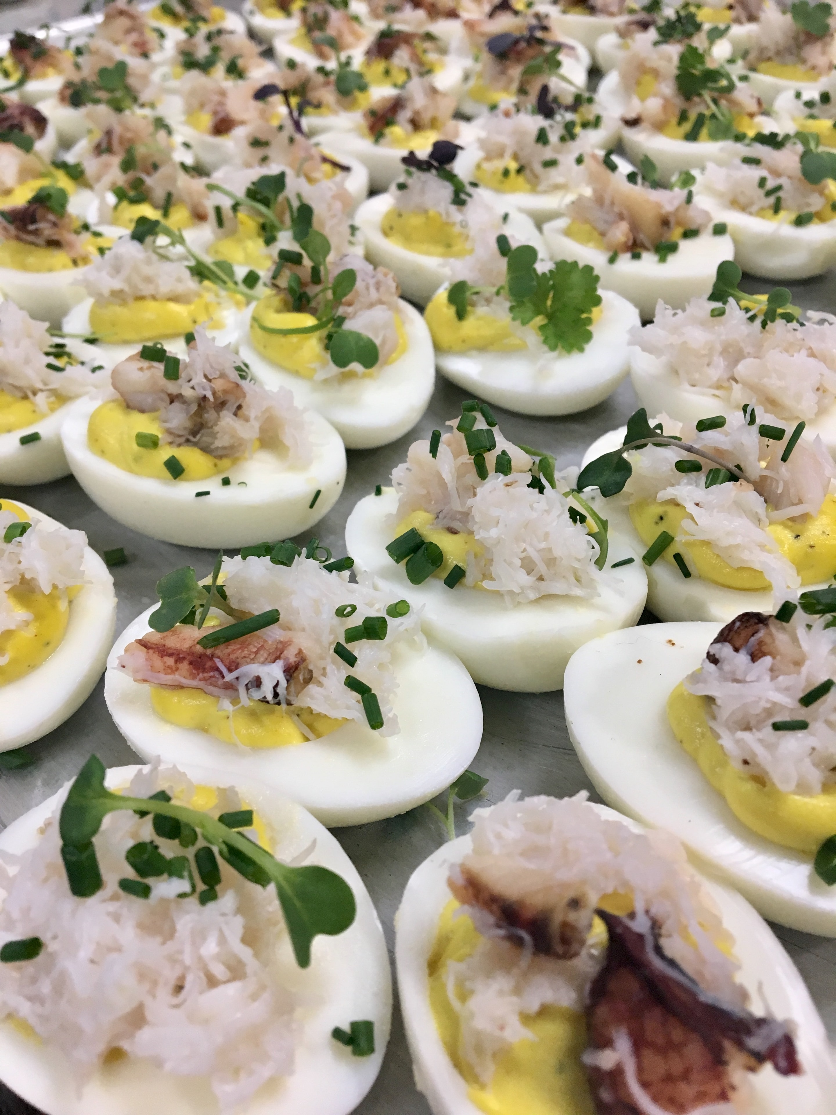 Deviled eggs with crab and herbs